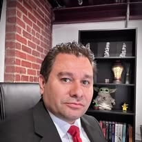 Crimson Solano in a suit